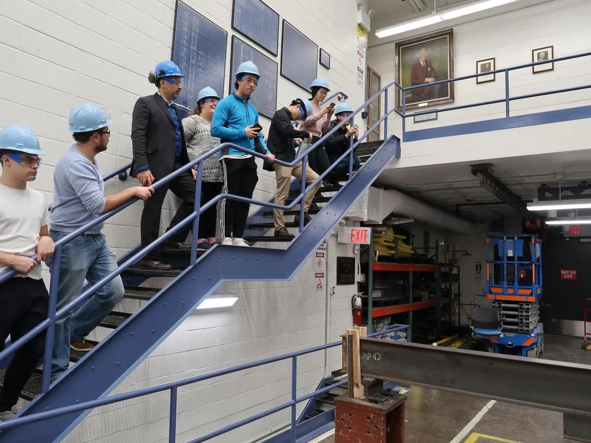 Students observing a buckling demo